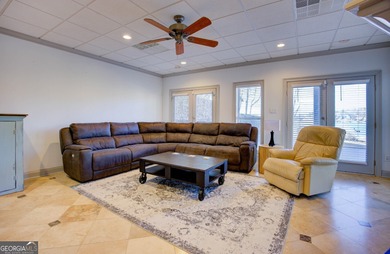 Assumable 5.25% financing on one of the most iconic modern on Turtle Cove Golf Course in Georgia - for sale on GolfHomes.com, golf home, golf lot