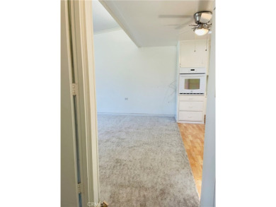 Mutual 1-20B is a lovely north facing unit on a gorgeous large on Leisure World Seal Beach Golf Course in California - for sale on GolfHomes.com, golf home, golf lot