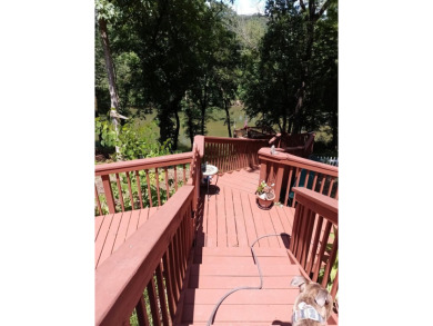 RIVERFRONT HOME located on South Fork River! Many updates on Cherokee Village North Course in Arkansas - for sale on GolfHomes.com, golf home, golf lot