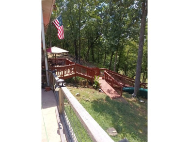 RIVERFRONT HOME located on South Fork River! Many updates on Cherokee Village North Course in Arkansas - for sale on GolfHomes.com, golf home, golf lot