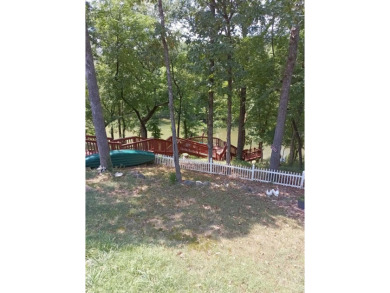 RIVERFRONT HOME located on South Fork River! Many updates on Cherokee Village North Course in Arkansas - for sale on GolfHomes.com, golf home, golf lot