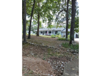 RIVERFRONT HOME located on South Fork River! Many updates on Cherokee Village North Course in Arkansas - for sale on GolfHomes.com, golf home, golf lot