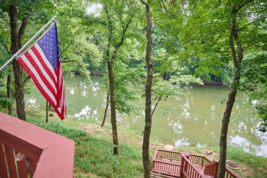 RIVERFRONT HOME located on South Fork River! Many updates on Cherokee Village North Course in Arkansas - for sale on GolfHomes.com, golf home, golf lot