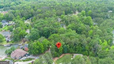 Serenely nestled in a peaceful area of the gated community of on Fairfield Plantation Golf and Country Club in Georgia - for sale on GolfHomes.com, golf home, golf lot