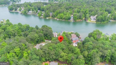 Serenely nestled in a peaceful area of the gated community of on Fairfield Plantation Golf and Country Club in Georgia - for sale on GolfHomes.com, golf home, golf lot