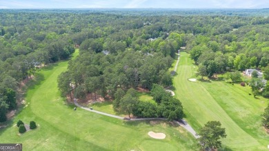 Serenely nestled in a peaceful area of the gated community of on Fairfield Plantation Golf and Country Club in Georgia - for sale on GolfHomes.com, golf home, golf lot