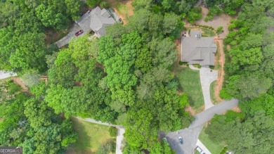 Serenely nestled in a peaceful area of the gated community of on Fairfield Plantation Golf and Country Club in Georgia - for sale on GolfHomes.com, golf home, golf lot