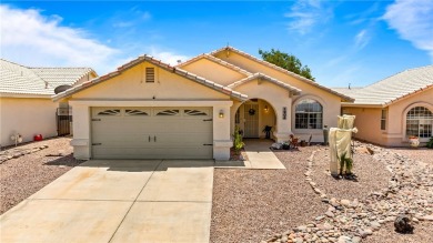 Step into this vibrant Fairway Estates home, where energy meets on Desert Lakes Golf Course in Arizona - for sale on GolfHomes.com, golf home, golf lot