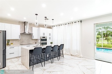 A beautiful, bright and spacious tastefully updated four on The Links At Boynton Beach - The Family Course in Florida - for sale on GolfHomes.com, golf home, golf lot
