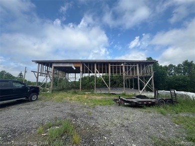 Introducing what may be the most exciting and iconic on Goodrich Country Club in Michigan - for sale on GolfHomes.com, golf home, golf lot