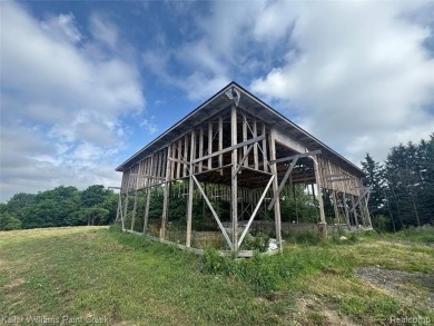 Introducing what may be the most exciting and iconic on Goodrich Country Club in Michigan - for sale on GolfHomes.com, golf home, golf lot