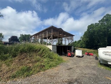 Introducing what may be the most exciting and iconic on Goodrich Country Club in Michigan - for sale on GolfHomes.com, golf home, golf lot