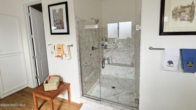 Welcome to this beautifully upgraded 2021 Carrington home in the on Prescott Lakes Golf and Country Club in Arizona - for sale on GolfHomes.com, golf home, golf lot