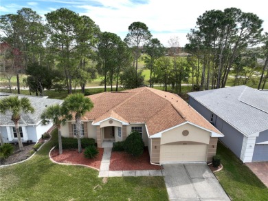 Exquisite 3-bedroom, 2-bathroom home offers unparalleled comfort on Tampa Bay Golf and Country Club in Florida - for sale on GolfHomes.com, golf home, golf lot