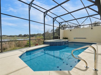 POOL HOME with spectacular WATER VIEW on Lake Miona! Nestled in on Miona Lake Golf Club in Florida - for sale on GolfHomes.com, golf home, golf lot