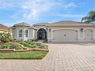 POOL HOME with spectacular WATER VIEW on Lake Miona! Nestled in on Miona Lake Golf Club in Florida - for sale on GolfHomes.com, golf home, golf lot