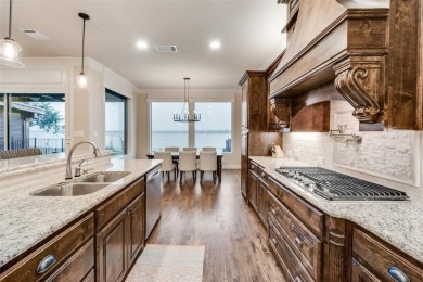 Stunning custom, lakefront home located in the 24 hr gated & on The Golf Club at Resort Eagle Mountain Lake in Texas - for sale on GolfHomes.com, golf home, golf lot