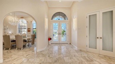 Bathed in natural light, with highly sought after southern lanai on The Oaks Club in Florida - for sale on GolfHomes.com, golf home, golf lot