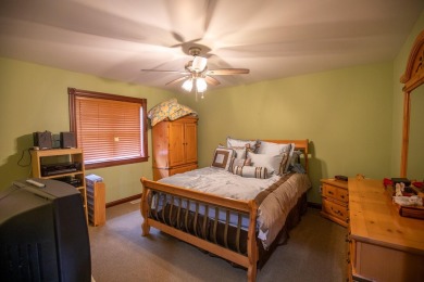 Located in the desirable Sand Creek community, this stunning on Sand Creek Golf and Country Club  in Indiana - for sale on GolfHomes.com, golf home, golf lot