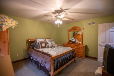 Located in the desirable Sand Creek community, this stunning on Sand Creek Golf and Country Club  in Indiana - for sale on GolfHomes.com, golf home, golf lot