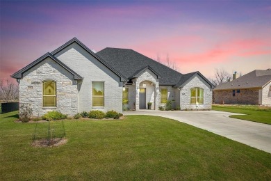 Gorgeous and better than new 4-bedroom, 3-full baths home on Pecan Plantation Country Club in Texas - for sale on GolfHomes.com, golf home, golf lot