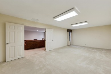 Luxurious and tastefully remodeled, this stunning 3-bedroom on Tallgrass Country Club in Kansas - for sale on GolfHomes.com, golf home, golf lot