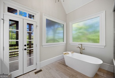 Nestled on a private cul-de-sac, this custom-designed estate on Chestatee Golf Club in Georgia - for sale on GolfHomes.com, golf home, golf lot