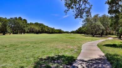 Welcome home to Showhouse Perfection in this beautifully on Halifax Plantation Golf Club in Florida - for sale on GolfHomes.com, golf home, golf lot