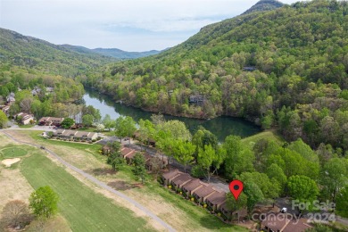 Fully furnished 2 bed/2 bath end-unit condo with sweeping views on Rumbling Bald Resort on Lake Lure in North Carolina - for sale on GolfHomes.com, golf home, golf lot