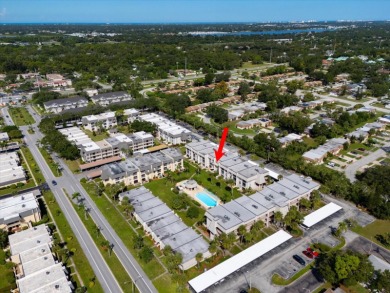 EASY FLORIDA LIVING AWAITS in this TOP FLOOR CONDO located in on Bayou Golf Club in Florida - for sale on GolfHomes.com, golf home, golf lot