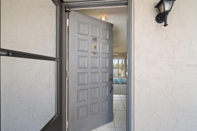EASY FLORIDA LIVING AWAITS in this TOP FLOOR CONDO located in on Bayou Golf Club in Florida - for sale on GolfHomes.com, golf home, golf lot