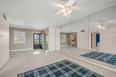 EASY FLORIDA LIVING AWAITS in this TOP FLOOR CONDO located in on Bayou Golf Club in Florida - for sale on GolfHomes.com, golf home, golf lot