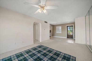 EASY FLORIDA LIVING AWAITS in this TOP FLOOR CONDO located in on Bayou Golf Club in Florida - for sale on GolfHomes.com, golf home, golf lot