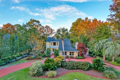 Set among majestic trees and lush landscaping in the highly on Snee Farm Country Club in South Carolina - for sale on GolfHomes.com, golf home, golf lot