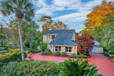 Set among majestic trees and lush landscaping in the highly on Snee Farm Country Club in South Carolina - for sale on GolfHomes.com, golf home, golf lot