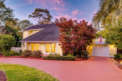 Set among majestic trees and lush landscaping in the highly on Snee Farm Country Club in South Carolina - for sale on GolfHomes.com, golf home, golf lot