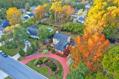 Set among majestic trees and lush landscaping in the highly on Snee Farm Country Club in South Carolina - for sale on GolfHomes.com, golf home, golf lot