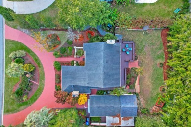 Set among majestic trees and lush landscaping in the highly on Snee Farm Country Club in South Carolina - for sale on GolfHomes.com, golf home, golf lot