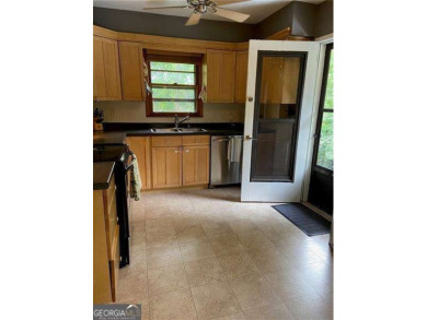 Welcome to 406 S Hillcrest Drive in Whitlock Heights - Just on City Club Marietta in Georgia - for sale on GolfHomes.com, golf home, golf lot