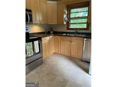 Welcome to 406 S Hillcrest Drive in Whitlock Heights - Just on City Club Marietta in Georgia - for sale on GolfHomes.com, golf home, golf lot