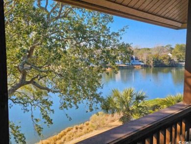 What a BEAUTIFUL view of the lake and ocean from this screened on Arcadian Shores Golf Club in South Carolina - for sale on GolfHomes.com, golf home, golf lot