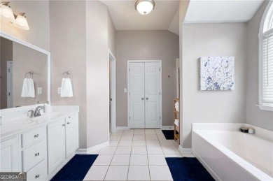 Welcome to this meticulously maintained four bedroom and three on Bridgemill Golf Club in Georgia - for sale on GolfHomes.com, golf home, golf lot
