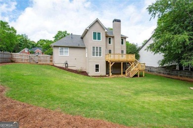 Welcome to this meticulously maintained four bedroom and three on Bridgemill Golf Club in Georgia - for sale on GolfHomes.com, golf home, golf lot