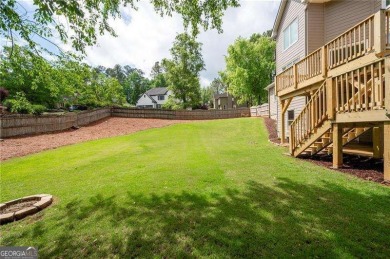 Welcome to this meticulously maintained four bedroom and three on Bridgemill Golf Club in Georgia - for sale on GolfHomes.com, golf home, golf lot
