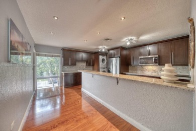 Beautifully updated 1 bedroom, 1 bathroom condo with a large on Country Club of Miami in Florida - for sale on GolfHomes.com, golf home, golf lot