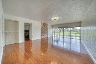 Beautifully updated 1 bedroom, 1 bathroom condo with a large on Country Club of Miami in Florida - for sale on GolfHomes.com, golf home, golf lot