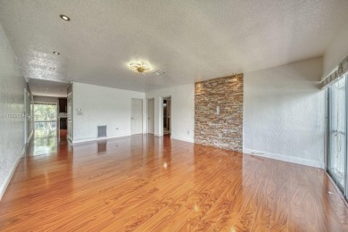 Beautifully updated 1 bedroom, 1 bathroom condo with a large on Country Club of Miami in Florida - for sale on GolfHomes.com, golf home, golf lot