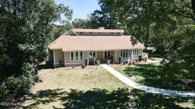 Located on the 18th green at Wilson Country Club, this beautiful on Wilson Country Club in North Carolina - for sale on GolfHomes.com, golf home, golf lot