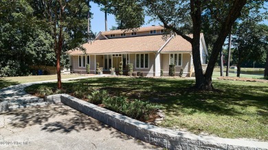 Located on the 18th green at Wilson Country Club, this beautiful on Wilson Country Club in North Carolina - for sale on GolfHomes.com, golf home, golf lot