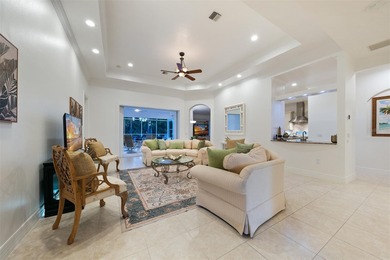 Low-maintenance, country club home with a private setting! Over on Boca Royale Golf and Country Club in Florida - for sale on GolfHomes.com, golf home, golf lot